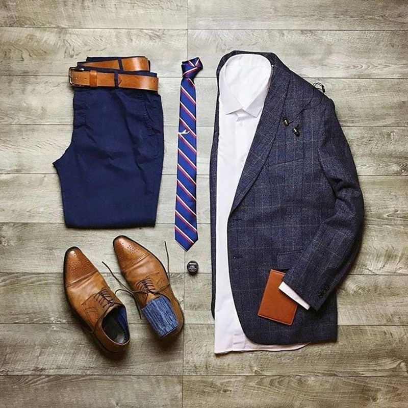 blue suit and sneakers