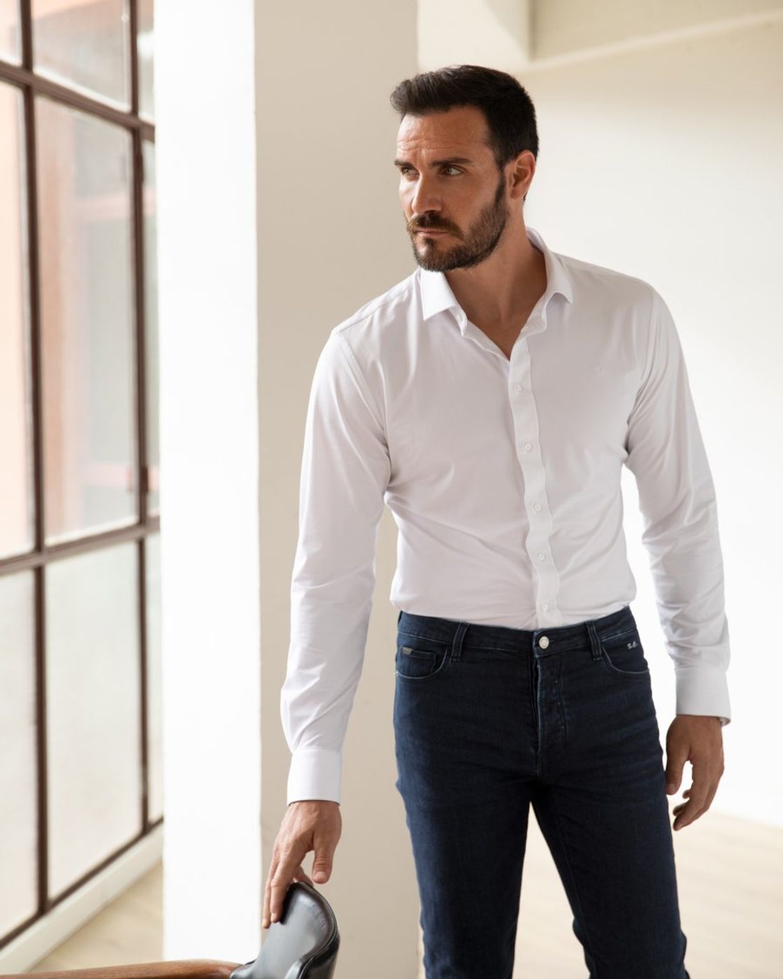 Man dressed in white button down shirt