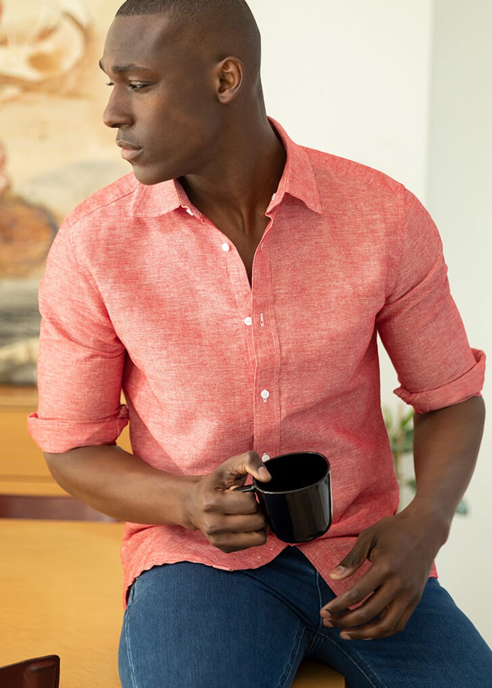 man dressed in red linen shirt